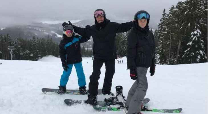 ديفيد بيكهام مع أولاده على الثلج