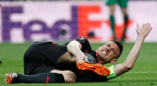 كوسيلني يتعرض لإصابة مبكرة امام أتليتكو مدريد